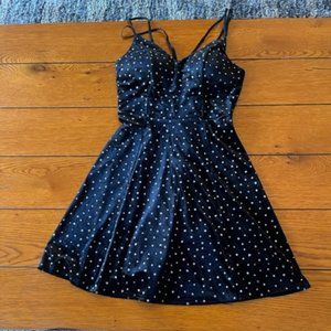 black dress with silver dotts.